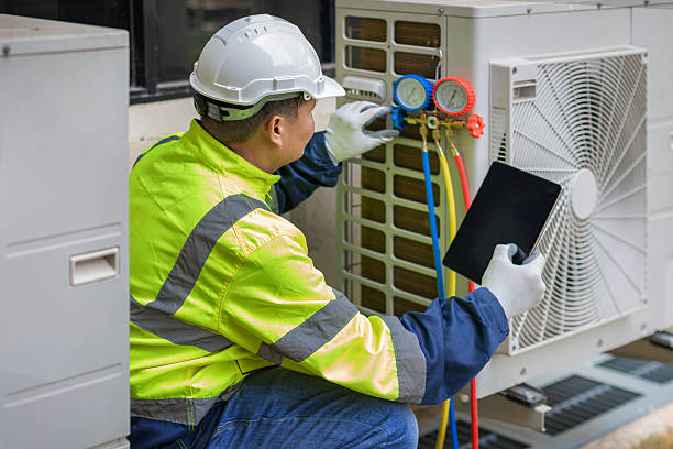 Professional Hvac technician working in Wheaton, IL